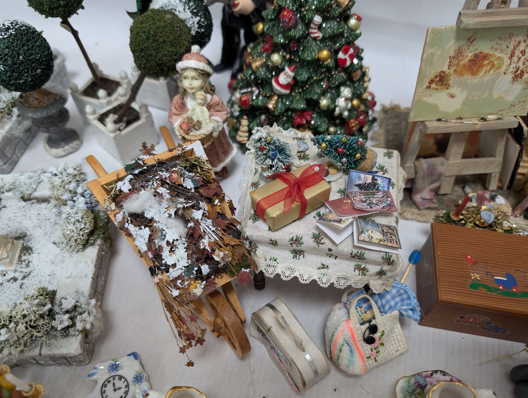 Dolls house conservatory and garden accessories, including sofa and chairs, trees, plants, paintings, Christmas decorations, etc 