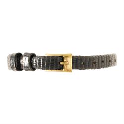 Piaget ladies 18ct gold manual wind wristwatch, silvered / champagne engine turned dial with dagger hour markers, back case No. 5635, Birmingham import mark 1956 with Helvetia hallmark, on black leather strap