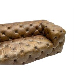 Three seat Chesterfield type club sofa, upholstered in deeply button Brazilian tan brown leather