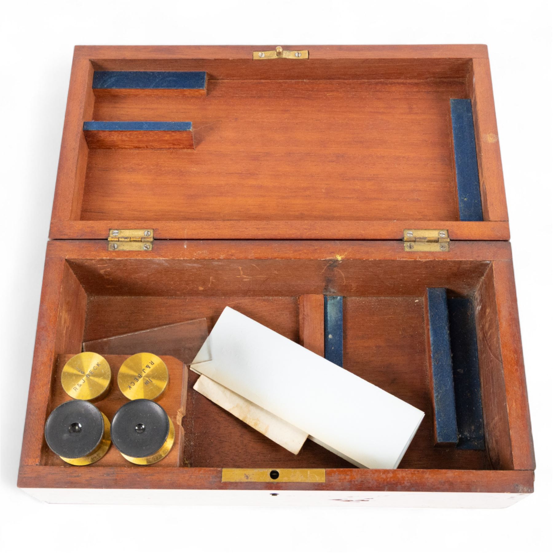Late 19th century brass microscope by R.J Beck London, serial no. 14496, with four spare lenses in wooden case, 

By vendor repute: Microscope is believed to have belonged to Charles Darwin's youngest son Horace. It was presented to Mount House School Tavistock in 1988 by G.J Willoughby Cashell. It was given to Mr Cashell's maternal great grand father Dr Thomas Lyle whose son Mr Thomas Lyle bequeathed it to his grandson, Mr Cashell. 