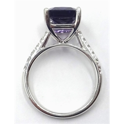  18ct white gold emerald cut purple sapphire ring, with diamond set shoulders hallmarked, sapphire 5.45 carat, diamonds approx 0.2 carat  