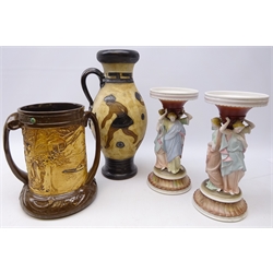  Bretby two handled vase decorated in relief with Chinoiserie design, H26cm, Classical Greek style jug with incised decoration and a pair of figural candlesticks (4)  