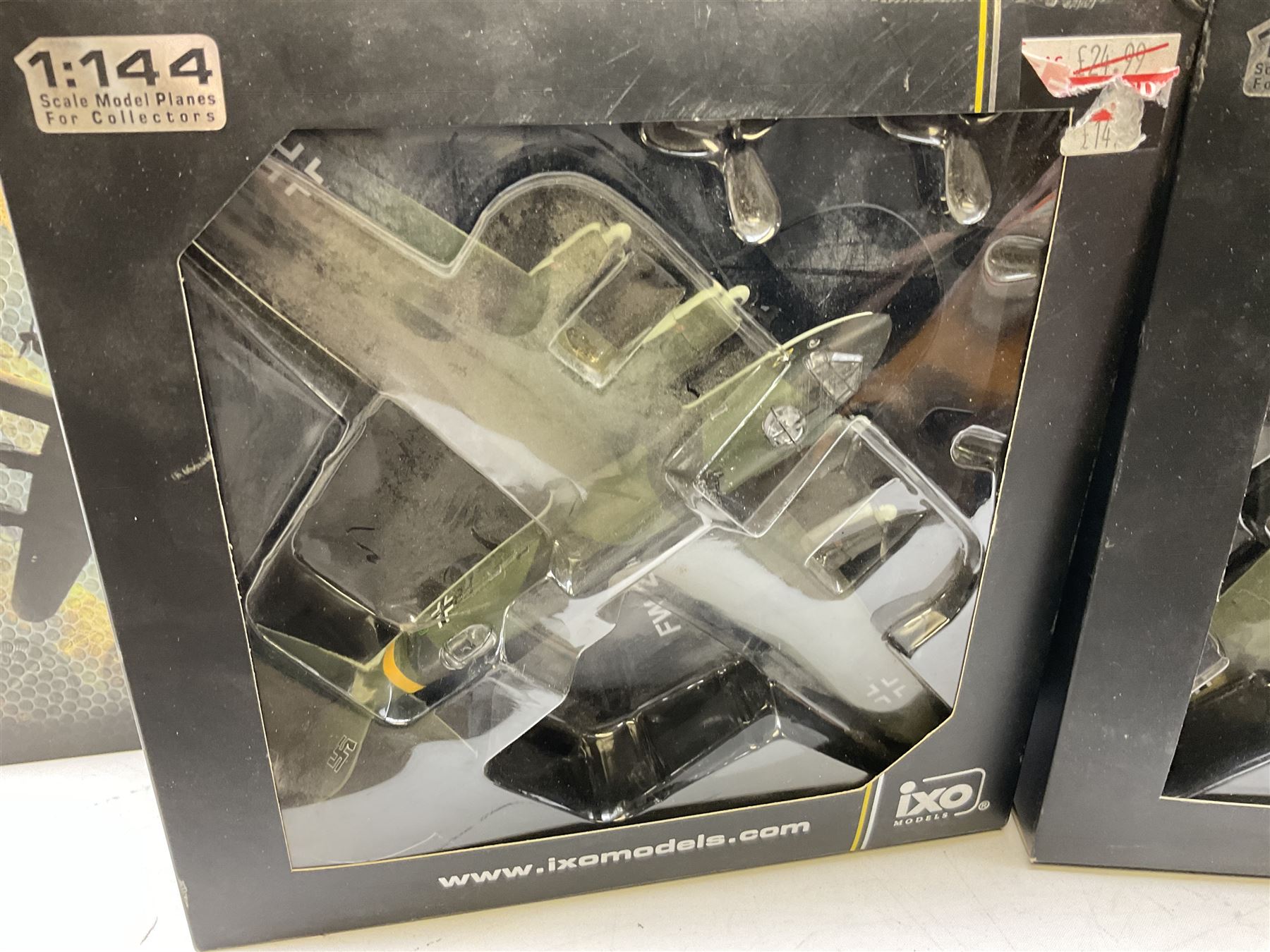 Nineteen Atlas Editions die-cast models of aircraft; to include Douglas Dakota C-47, Forke Wulf, Handley Page Halifax, De Havilland DH-98 Mosquito Mk.IV, etc and two others similar by IXO Models; all boxed (21)

