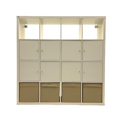 Ikea white wall unit, fitted with shelves, cupboards and sliding fabric storage boxes