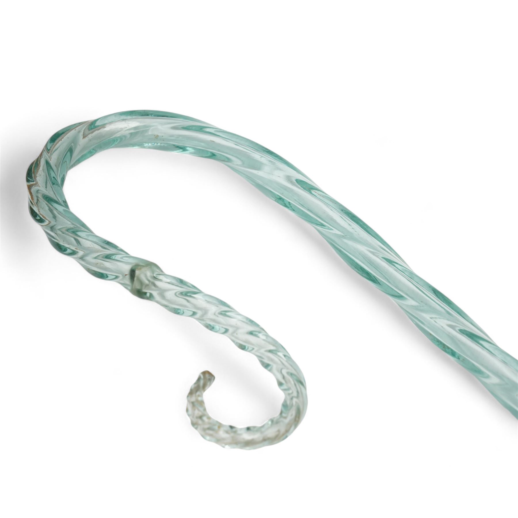 Five glass walking canes, including a Victorian cane with red helix twist pattern, shepherds crook, with barley twist decoration, amber glass and two others, max L155cm approx 