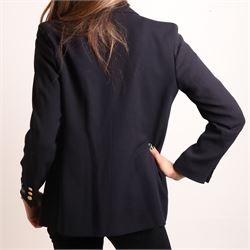 Burberrys – navy wool blazer and silk shirt, the blazer made in England, with gilt Burberry buttons, embroidered monogrammed breast pocket, black lining with Burberry motif and branded sleeve label, size S/M; the blouse in black 100% silk with all-over novelty print of keys, padlocks, coins and Burberry check motifs in yellow, orange and red, size S, made in Italy (2)
