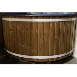 Deluxe fibreglass circular hot tub with cover, electric heater - unused