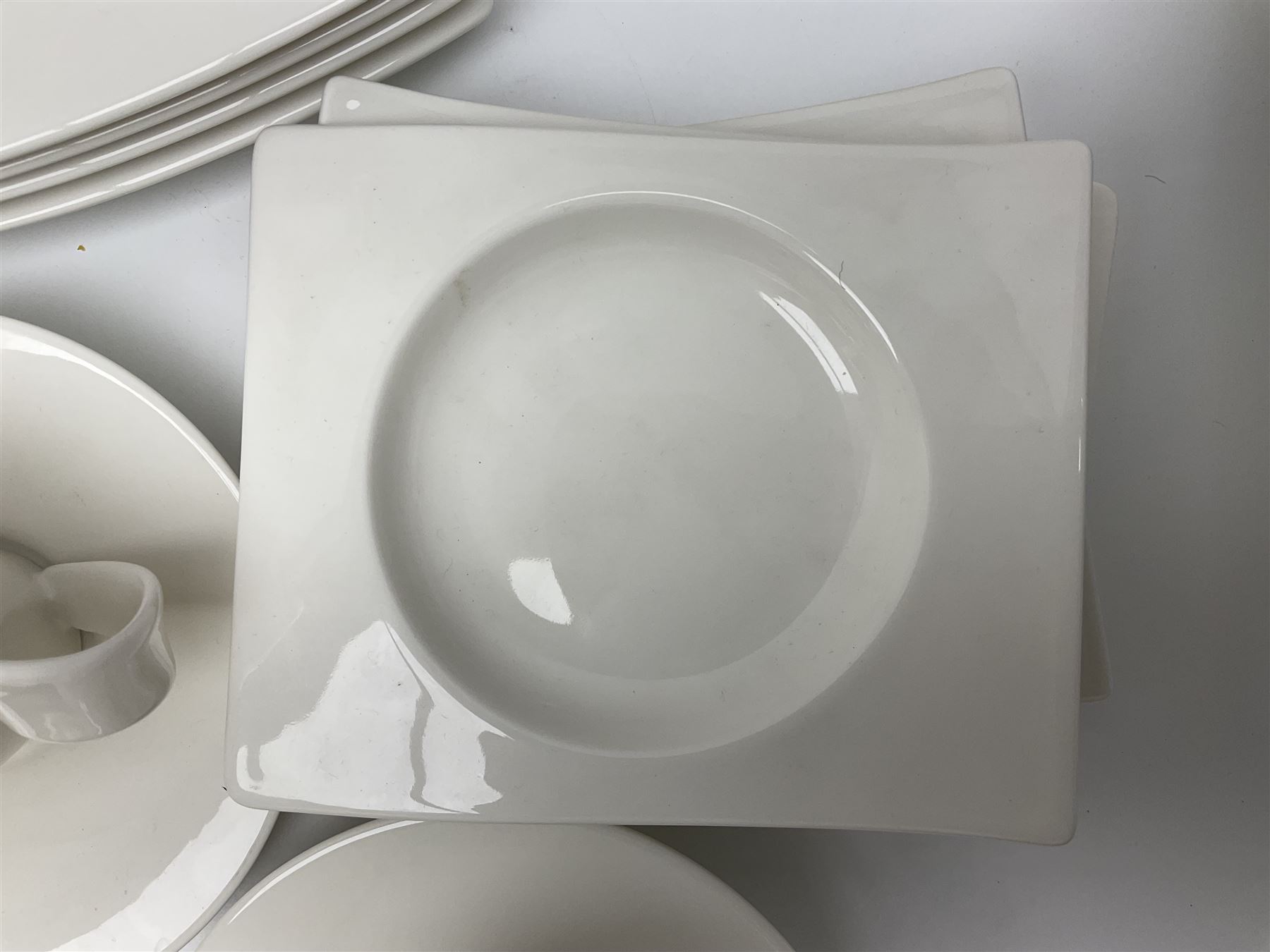 Villeroy & Boch New Wave pattern dinner and tea service for five people, comprising square dinner plates, rectangular dinner plates, pasta bowls, cereal bowls, coffee cups and saucers, side plates and dessert plates, all with printed mark beneath