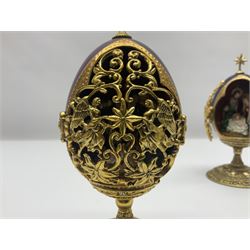 Franklin Mint House of Faberge three collectors eggs, comprising A king is born, We three kings, The flight into Egypt