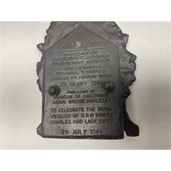 Two early 20th century cast-iron money banks - 'Our Kitchener Bank' c1914 H17cm and 'Our Empire Bank' c1911 depicting George V and Queen Mary H17cm; both by Sydenham & McCoustra; and another similar for The Prince & Princess of Wales 1981 by Robert Brown (3)