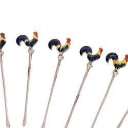 Set of six early 20th century silver cocktail sticks with enamel cockerel finials, stamped Sterling Silver