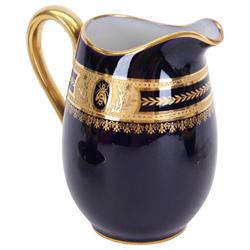 Limoges Coffee can and saucer, jug and open sucrier, all decorated with gilt boarder and decorated with bees framed with laurel leaves, with makers mark beneath