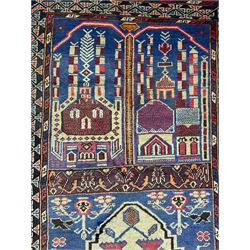 Old Baluchi rug, with panels depicting buildings and stylised flower motifs