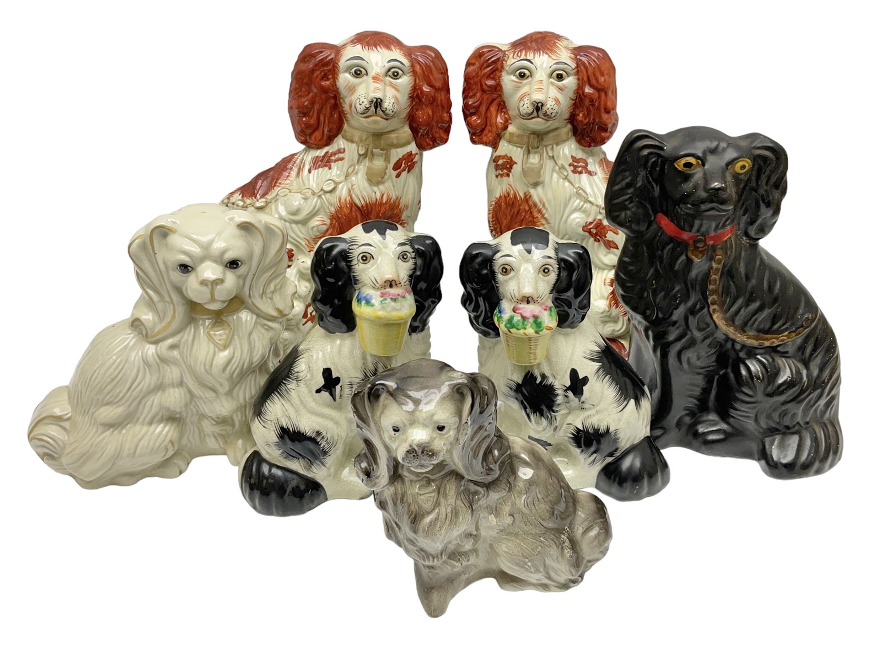 Two Pairs of Staffordshire style dogs, together with three other examples, largest example H27cm