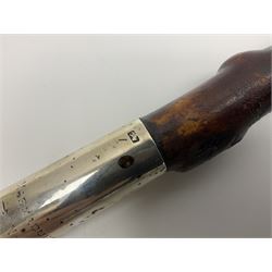 Victorian trap/coaching whip, principally in blackened thorn wood, with a silver cap engraved 'Marmaduke Furness Esquire Nov 1st 1904', hallmarked London 1900, makers mark AC, L173cm 