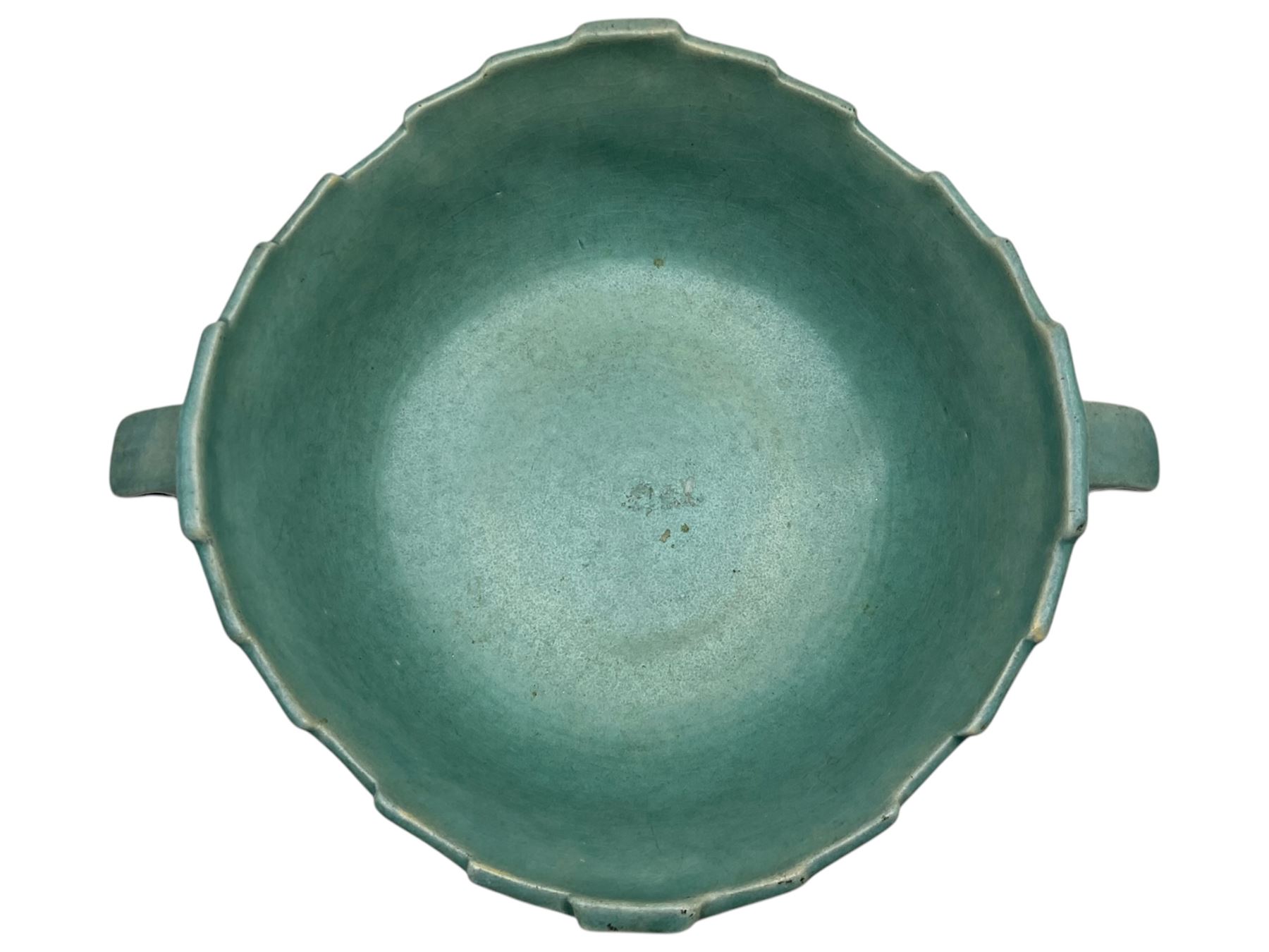 Roseville pottery twin handled bowl, decorated with clematis on a blue ground, marked ‘Roseville USA 457-8’ to the base