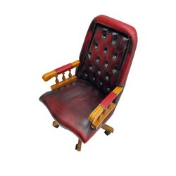 Swivel office chair, upholstered in buttoned red leather