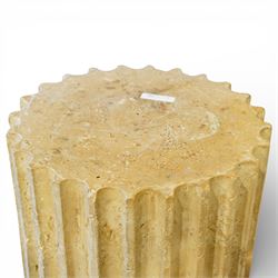 A pair of early 20th century Italian Neoclassical pedestal columns of simplified Doric type; each of fluted cylindrical form in composite stone, finished to evoke weathered limestone or travertine, raised on square plinth bases