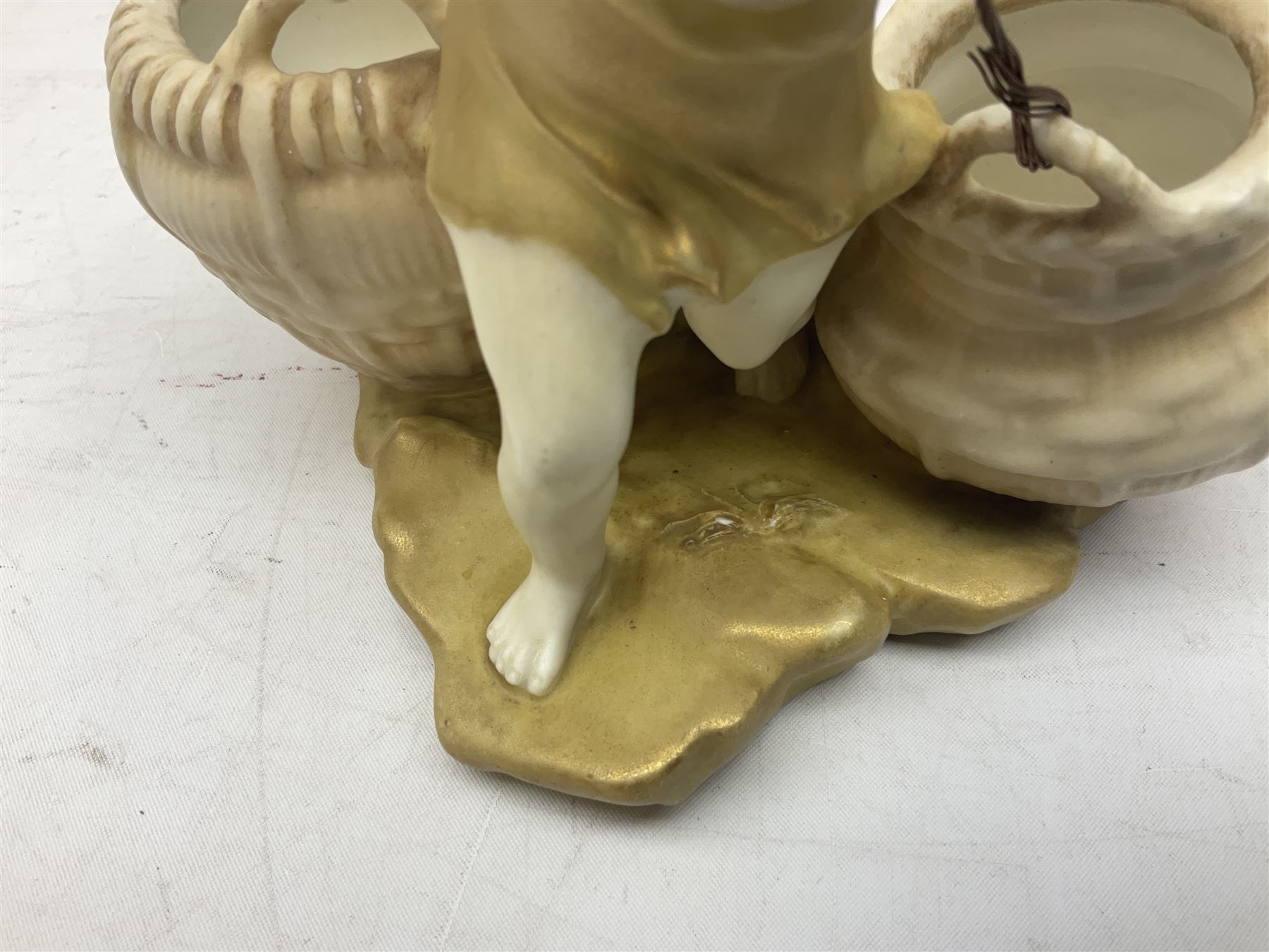 Royal Vienna Ernst Wahliss Art Nouveau figure, of a child pulling two baskets, H15cm