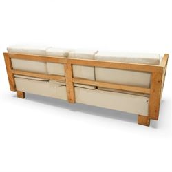 Mid 20th century German Art Deco oak framed divan day bed, rectangular form with slatted side supports, upholstered in cream linen with three removable back cushions, three seat cushions and cylindrical bolster arms, on block feet