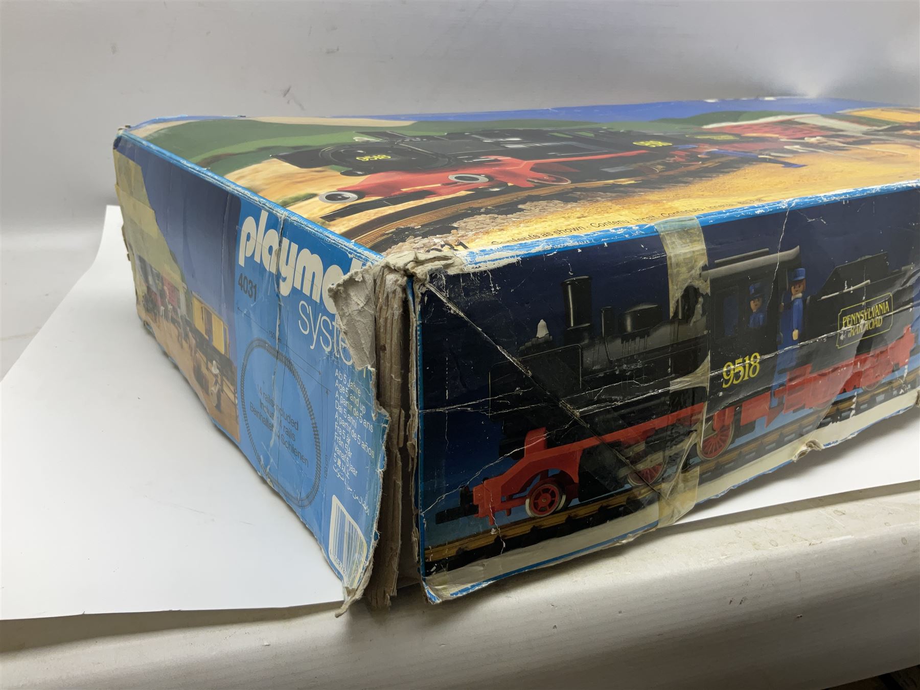 Playmobil 'G' gauge - 4031 Pennsylvania Railroad train set with 2-4-0 locomotive No.9518, tender, cattle truck and brake van, quantity of track, controller and other accessories; boxed with outer delivery packaging