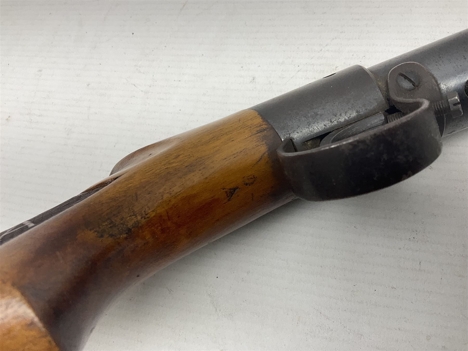 Early 20th century BSA Standard .177 Cal. Air Rifle (No.1), early A prefix number A67, with blued finish, top-loading, push-button underlever action, walnut semi-pistol grip stock with chequered BSA logo L101cm overall; with contemporary canvas case; NB: AGE RESTRICTIONS APPLY TO THE PURCHASE OF AIR WEAPONS.
