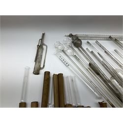 Collection of 19th century and later pharmaceutical laboratory glass, to include, thistle funnels, volumetric pipettes, used and unused test tubes, burettes, etc, (42+) Provenance: discovered in the storeroom of a long established Hull pharmacist and opticians 