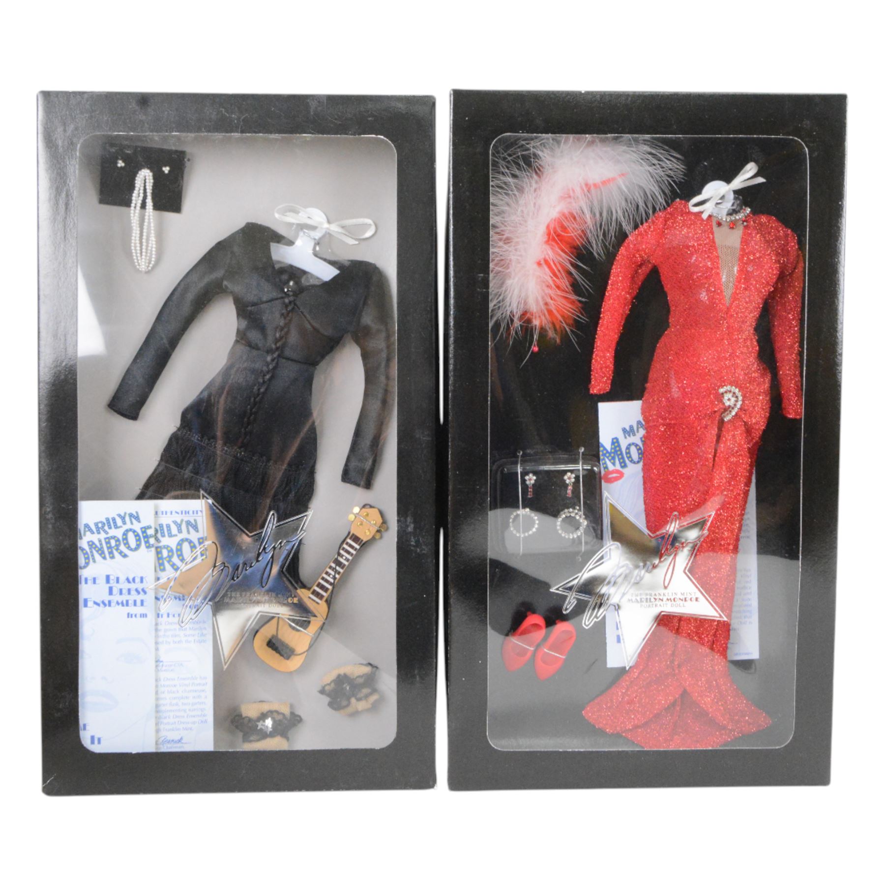 Franklin Mint Marilyn Monroe portrait doll, dressed in Gentleman Prefer Blondes pink dress, together with a wardrobe trunk and four outfits, comprising white dress from The Seven Year Itch, black dress from Some Like It Hot, red glitter dress with feather headress from The Seven Year Itch and the 'Happy Birthday Mr President' nude dress, all boxed with certificate of authenticity