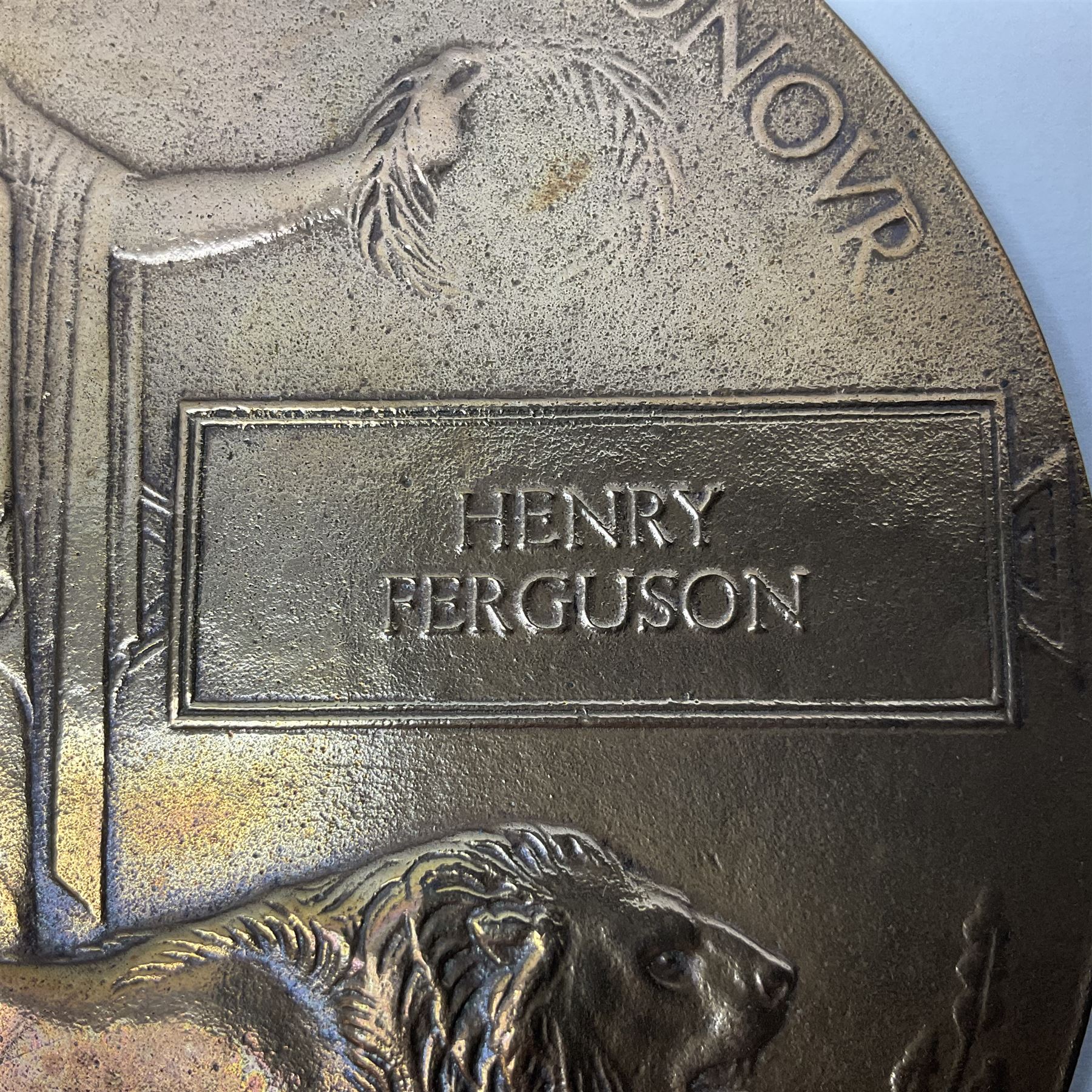 WWI pair of medals comprising British War Medal and Victory Medal awarded to G/62196 Pte. H. Ferguson R. Fus. with ribbons on wearing bar; together with bronze memorial plaque to Henry Ferguson (3)