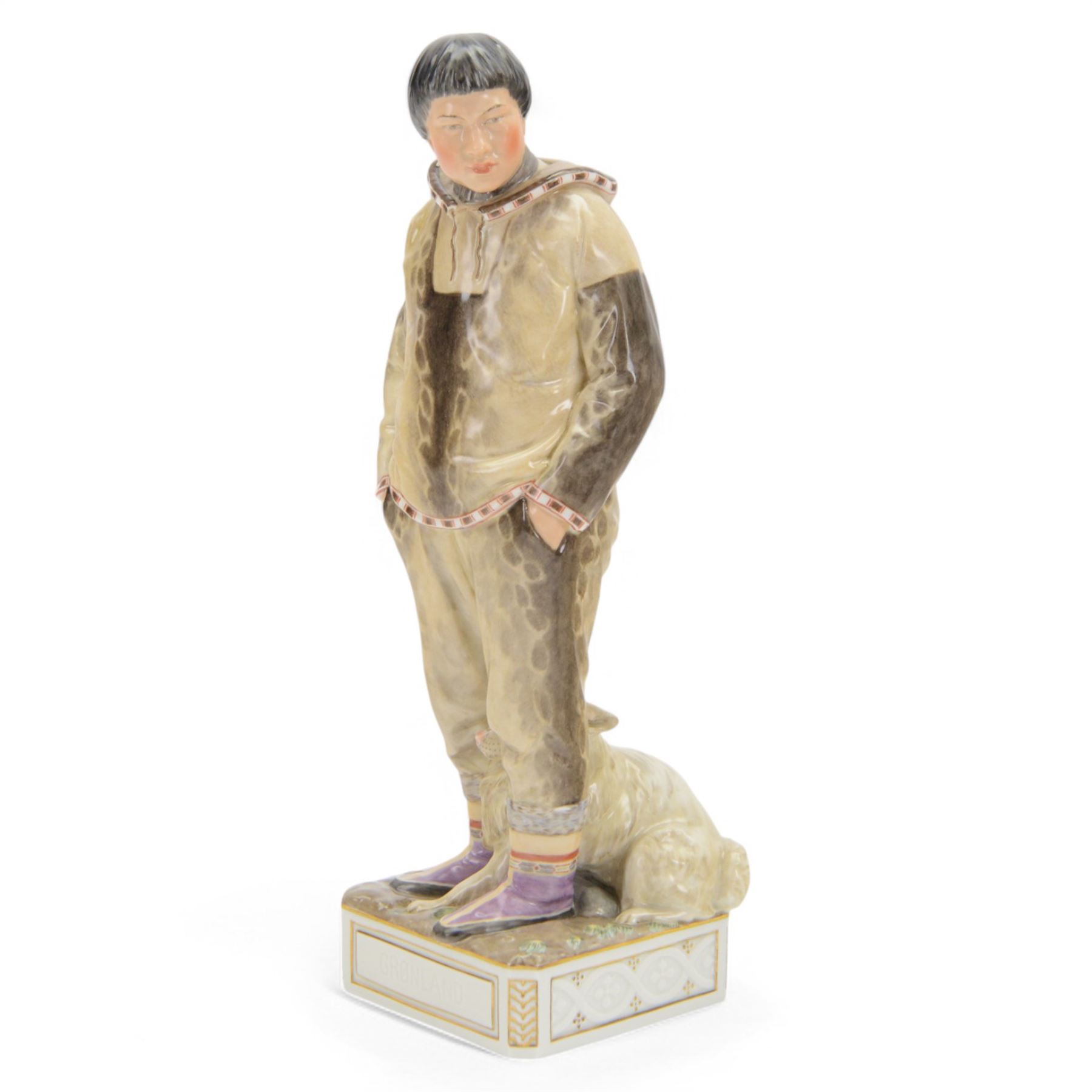 Royal Copenhagen Greenlandic figures, Man with Sledge dog by Carl Martin-Hansen, no.12225, with printed mark beneath, H32cm