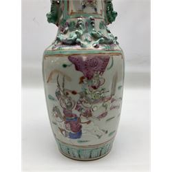 Chinese Canton Famille Rose vase, decorated in enamel with figural panels against floral and foliate ground, with dragon handles and lizard shoulders, H26cm