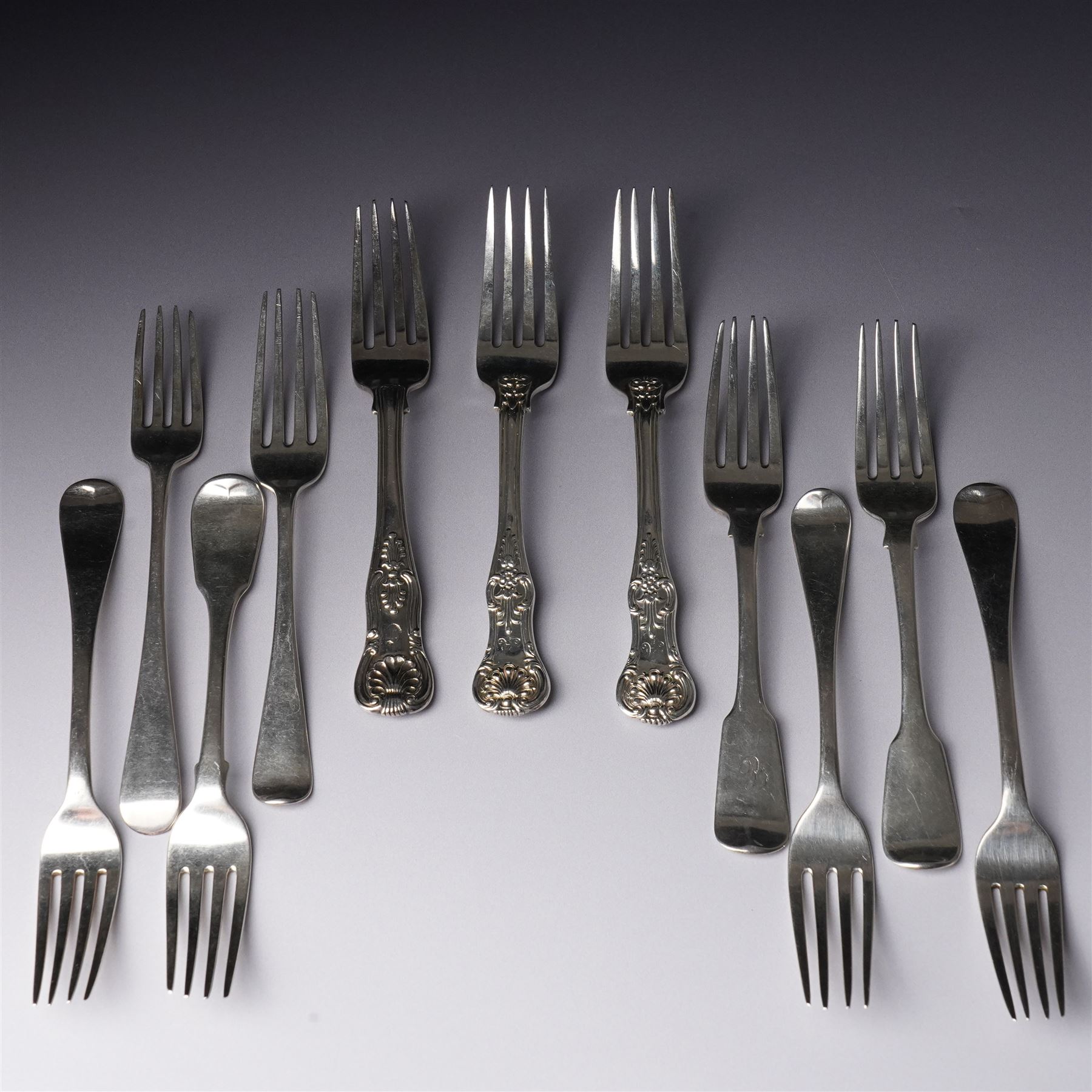 Pair of George IV silver fiddle pattern dessert forks, London 1824, another pair London 1828 and seven other 19th century silver dessert forks various dates and makers (11)