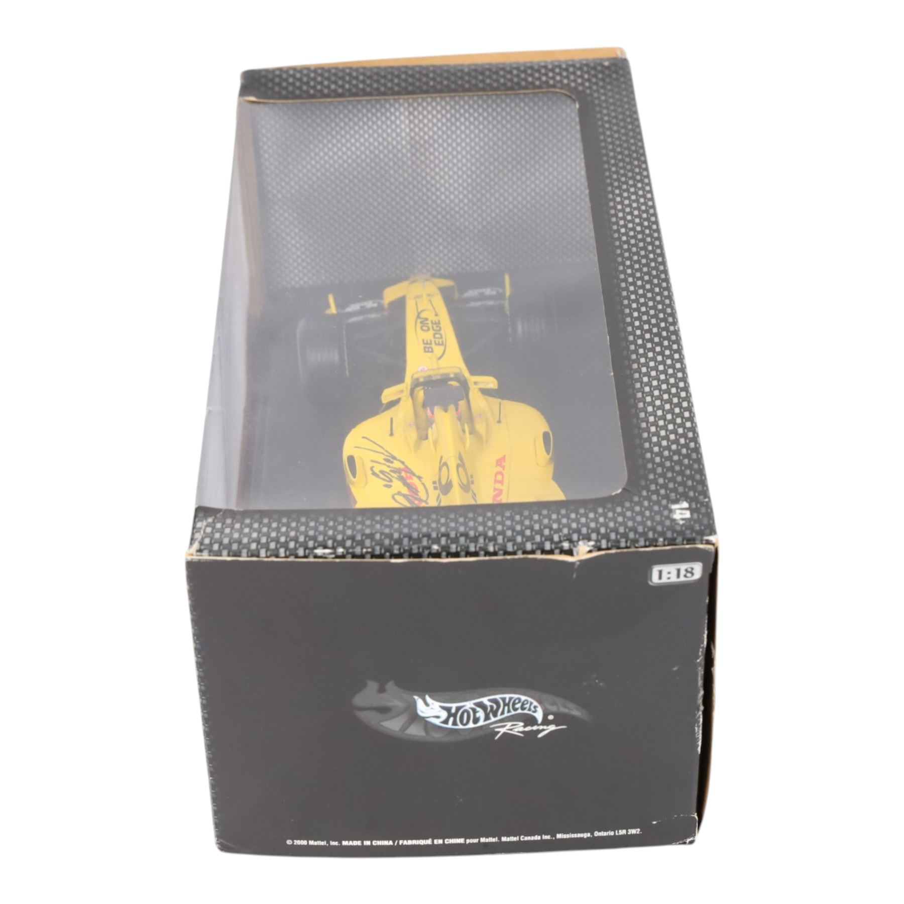 Three signed limited edition 1:18 scale Formula One models, comprising Hot Wheels Jordan EJ12 signed by Takuma Sato, Hot Wheels Jaguar Racing R2 signed by Eddie Irvine and a Minichamps Williams F1 Team model signed by Jenson Button, 1:18 scale model, all boxed