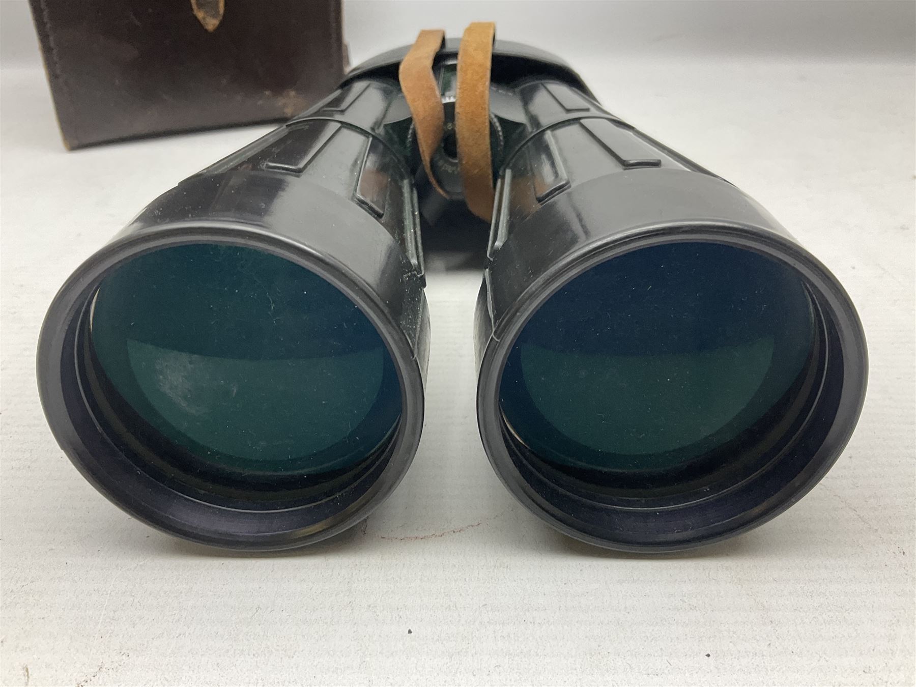 Pair of Optolyth 12 x 63 binoculars, made in Germany, serial no 82186, in leather case