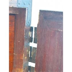 Late 19th century Japanese tansu chest, crafted with a cedar frame and cypress wood panels, original iron fittings throughout, comprising a single long drawer above smaller drawer and hinged cupboard door enclosing two smaller internal drawers and storage compartment, mounted on a bespoke black metal stand