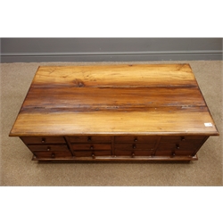  Late 20th century hardwood apothecary style storage coffee table, hinged lid, twelve small drawers, brackets supports, W120cm, H44cm, D64cm  