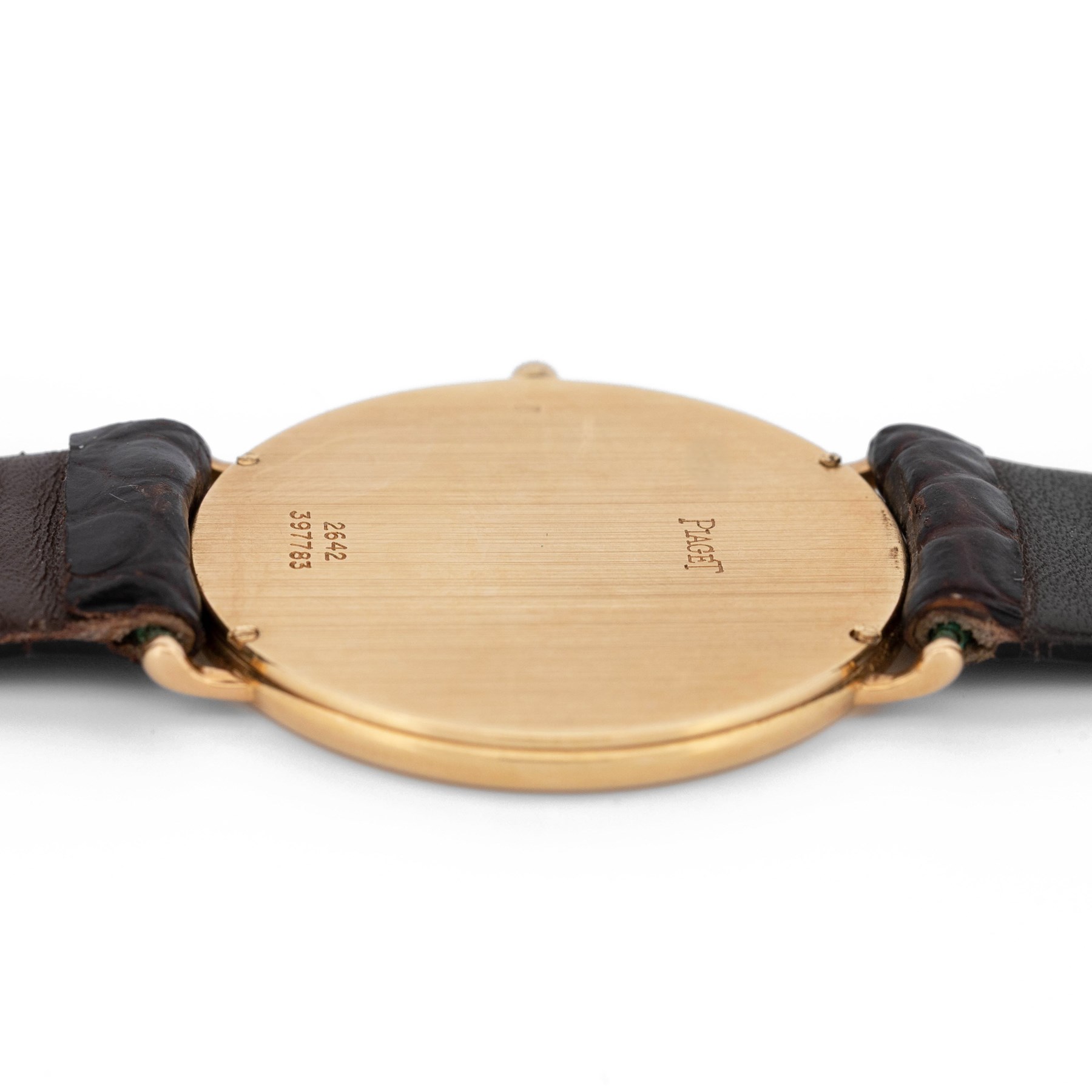Piaget Altiplano ultra thin 18ct gold diamond set manual wind wristwatch, Ref. 2642, Cal. 20P2, silvered dial with baton hour markers, the gold outer ring set with eight round brilliant cut diamonds, on brown leather strap with Piaget 18ct gold buckle and 18ct gold diamond set spacer