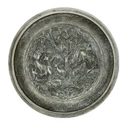 Eastern tin charger, decorated with a central circular panel in low relief of figures and deer, within a hammered border, D41cm