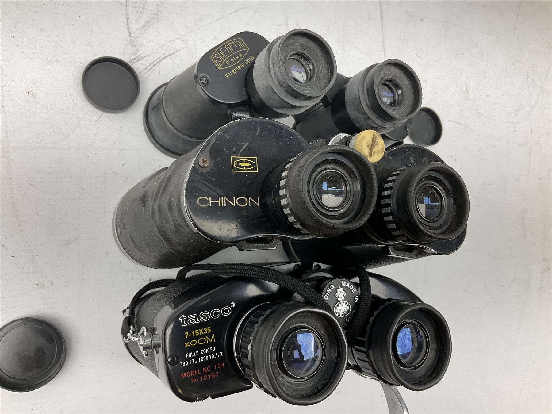 Eleven cased pairs of binoculars, to include Omiya 8x30, Tasco, Esde-Optik 8x40 Weitwinkel, Chinon 10x50 Field. Aico Rapide 8x30, Astralite zoom 6x- 14x32, etc