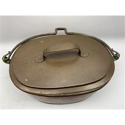 Victorian seamed copper fish kettle, of typical form with iron swing handle, the cover opening to reveal a tin lined interior and twin handled pierced strainer, not including swing handle L48cm, including handle to cover H30cm