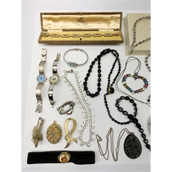 A collection of Vintage and later costume jewellery, to include a ladies Gucci wrist watch, a jet pendants, marcasite brooch, Celtic brooch, etc. 