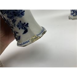 Pair of 19th century Delft blue and white vases, of canted baluster form, decorated with birds amidst flowers within a moulded C scroll surround, H22cm 