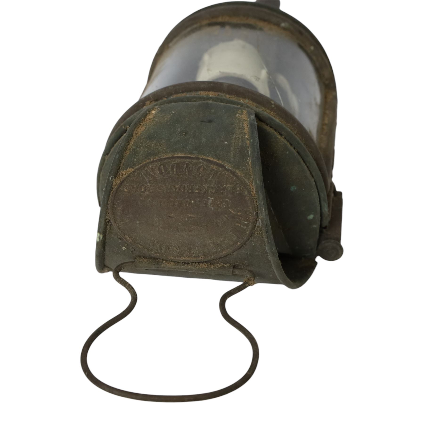 20th century brass and copper carriage lantern, with curved glass front, the brass oval plaque with details for Shand Mason & Co Fire Engine makers, Upper Ground Street, Blackfriars Rd, London, H32cm