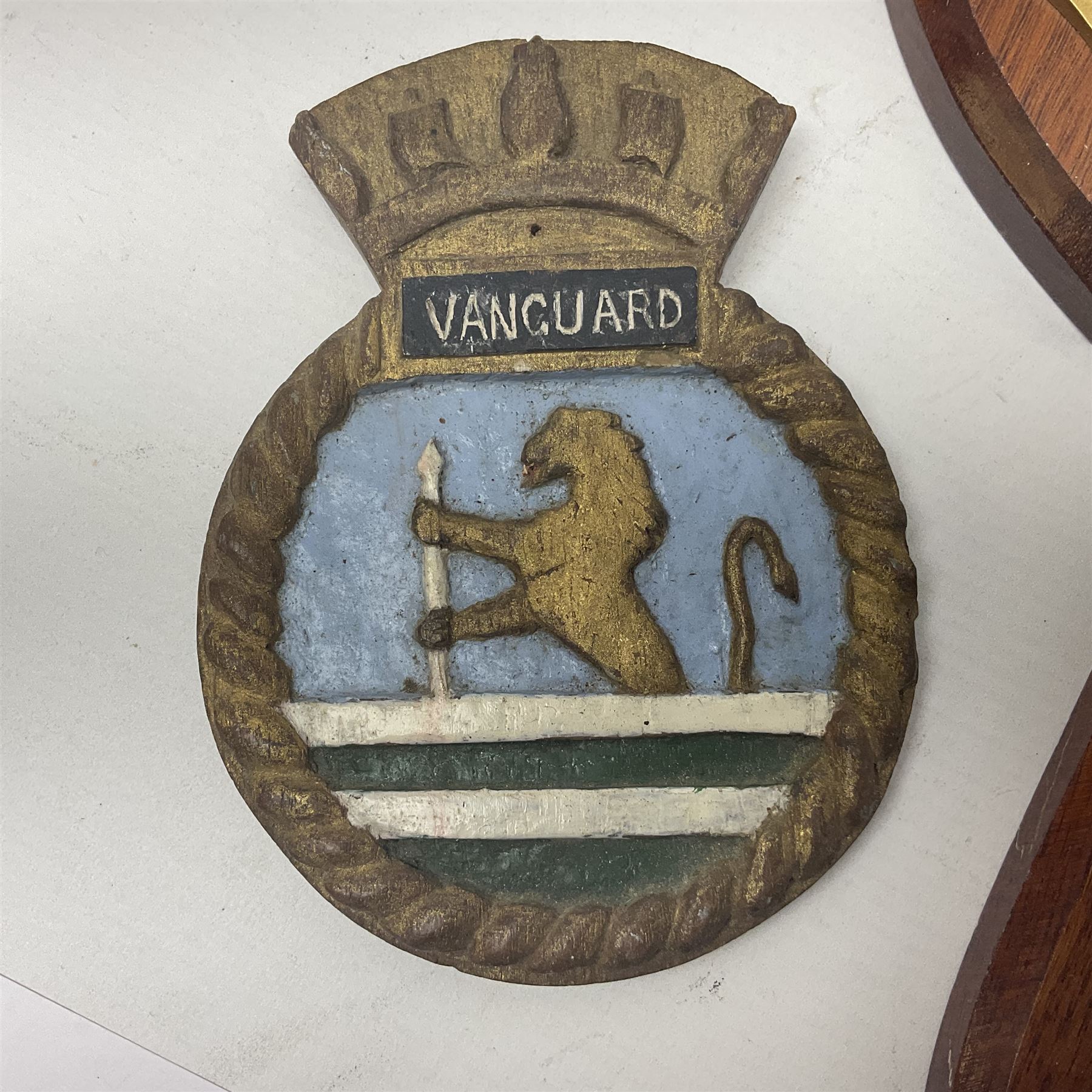 Six Naval wall shields, including HMS President, Vanguard, HMS Kilmorey etc, and another plaque 