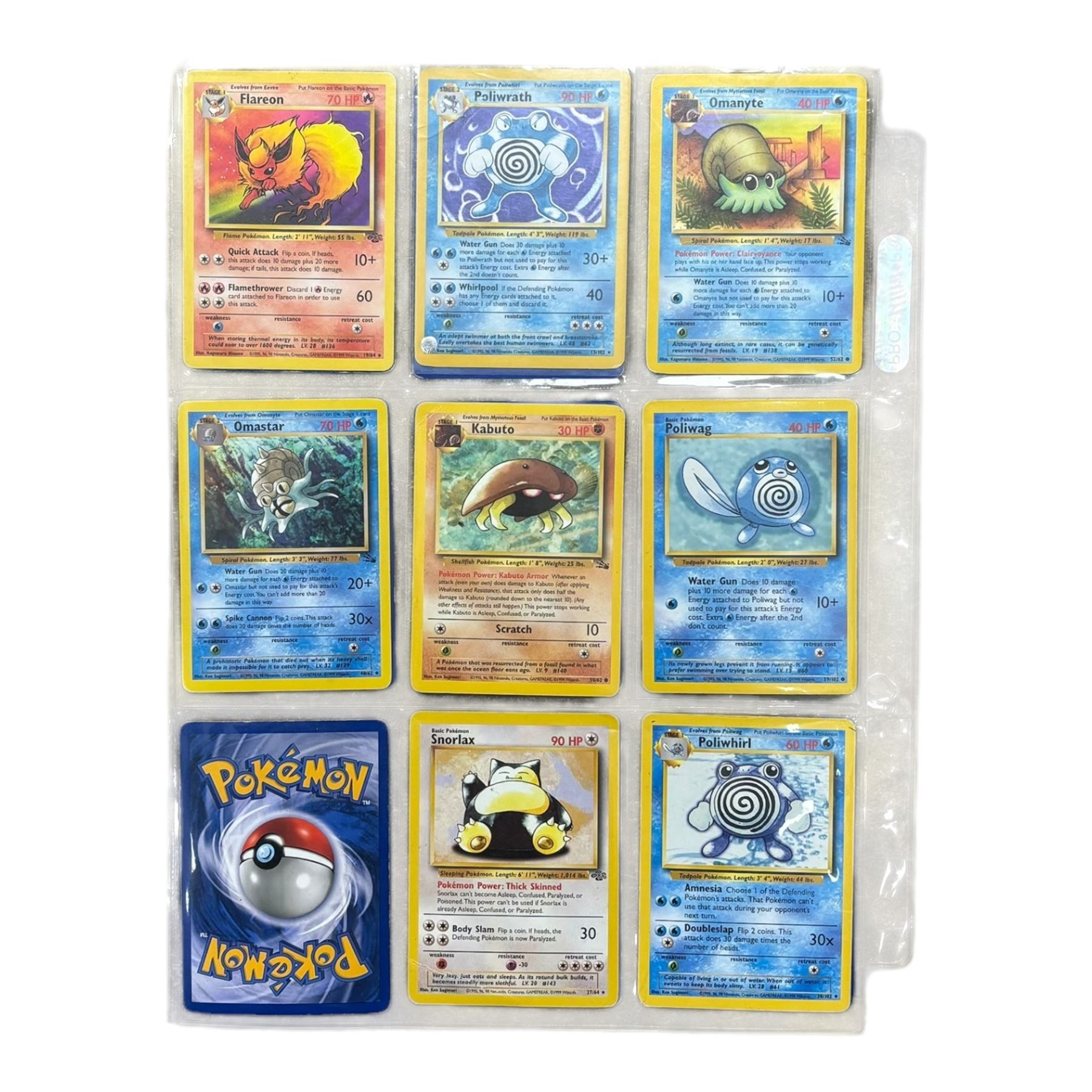 Collection of mainly vintage Pokemon cards including Charizard Base Set Holographic number 4/102 and two Ancient Mew 2000 promo cards, some housed within plastic wallets and some loose