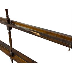 Victorian pitch pine wall rack, three heights over sliding cupboards