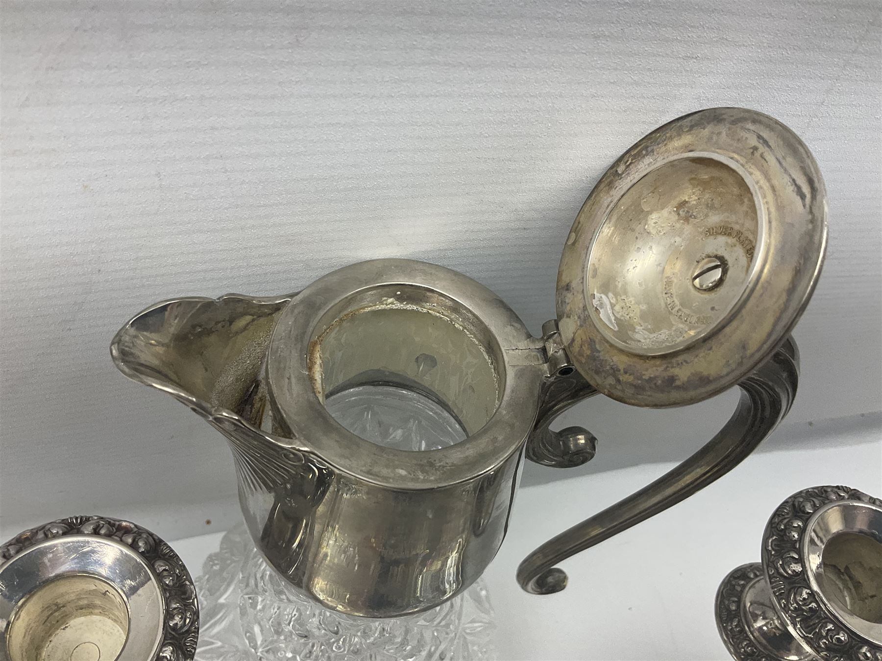 Glass claret jug, with silver plated top, together with other silver plate, to include pair of candelabras and tray with claw feet, jug H30