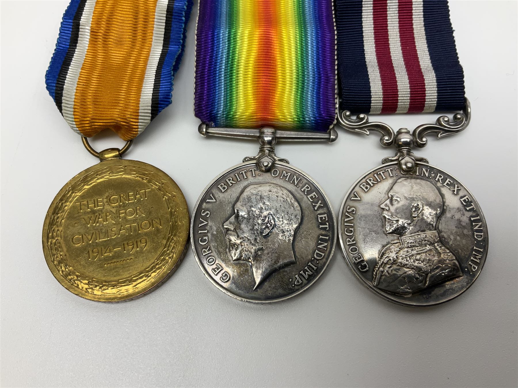 WW1 Military Medal group of three comprising MM, British War Medal and Victory Medal awarded to 44772 Pte. T. Clamp 5/York: & Lanc: R.; all with ribbons on hanging bar