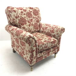 Alstons armchair, upholstered in a red and beige Henna floral fabric, W97cm