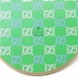 Gucci x Palace skateboard, Spring/Summer 2021, green GG monogram wood deck with multicolour ‘AH AH AH! GUCCI’ lettering and cartoon character mascot motif, fitted with Gucci-branded metal trucks and red and cream wheels, model no. 689103 JCGMN, presented with original GG monogram drawstring dust bag, protective sleeve, outer box and accompanying cards, Skateboard L81cm W20cm